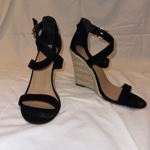 Black suede strappy wedge espadrilles.       Style: Genova